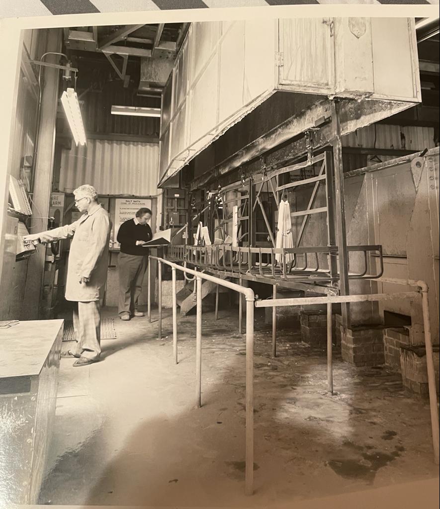 Charlie Hutchison (left) at his workplace at Hurn Airport (now Bournemouth Airport) where he worked as a metal normaliser.