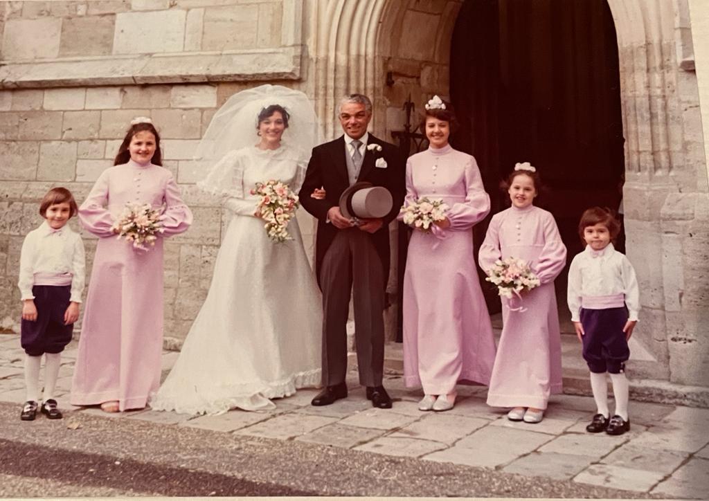 Charlie Hutchison attending his daughter's wedding, Christchurch priory, 1974.