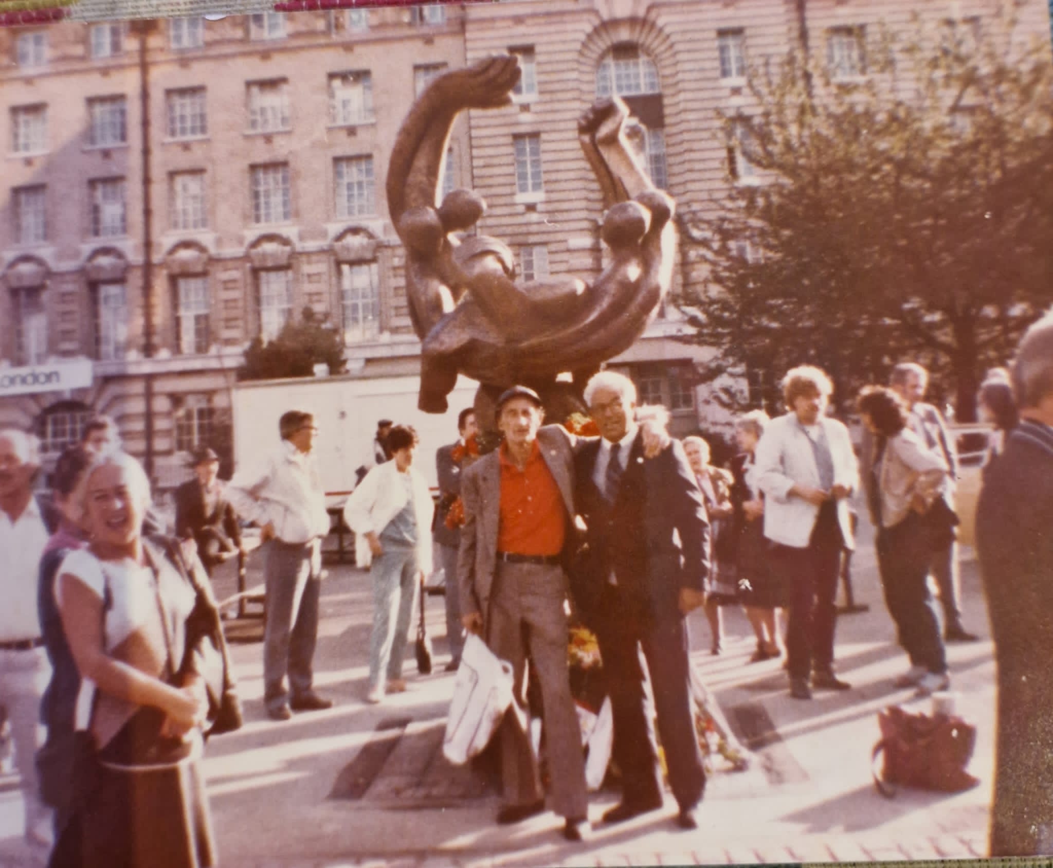 Charlie Hutchison poses with a man infront of the International Brigade Memorial, Jubilee Park, 1985.
