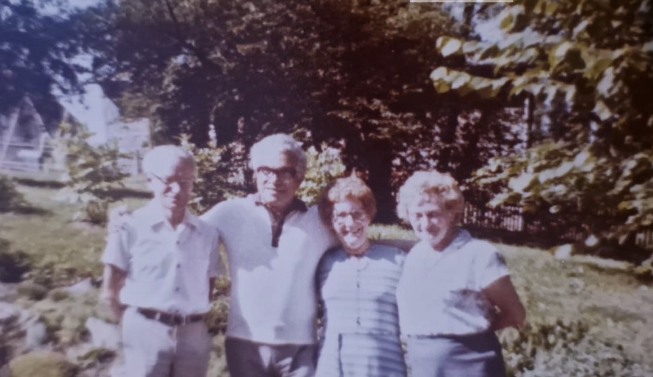 Charlie Hutchison poses with his wife and two friends.